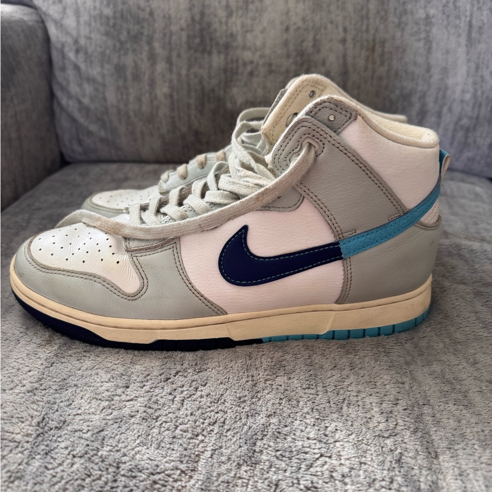 Nike High-Top Sneakers with Blue Swoosh
